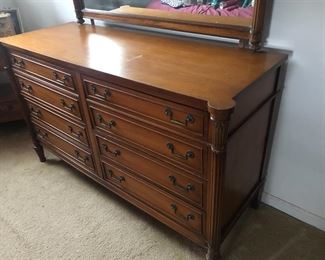 Beautiful solid wood bedroom set.  Includes dresser, mirror, armoire, headboard/footboard, two night stands