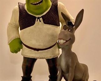 Lot 8000.  $625.00 Shrek 2 Limited Edition character replica of Shrek 2 and Donkey on a metal base.  COA is numbered 23/1000.  Low  COA edition number!!! 	Shrek is 29" Tall the metal base is 24" x 16"