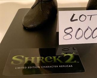 Lot 8000.  $625.00 Shrek 2 Limited Edition character replica of Shrek 2 and Donkey on a metal base.  COA is numbered 23/1000.  Low  COA edition number!!! 	Shrek is 29" Tall the metal base is 24" x 16"