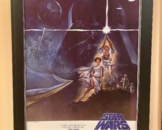 Lot 8002.  $225.00. Star Wars 1977 20th Century  Fox movie poster replica in double edge frame. "A Long Time ago, in a Galaxy far far away..."	31" W x 43" T	