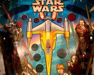 Lot 8001.  $3,995.00  Star Wars Episode 1 Pinball Machine by Williams Electronics, 1999-2000.  Completely working and includes Manuals.  The pinball machine is in pristine condition.  Ready to test your Pinball Wizard Skills.  WOW!!! Great Graphics. 