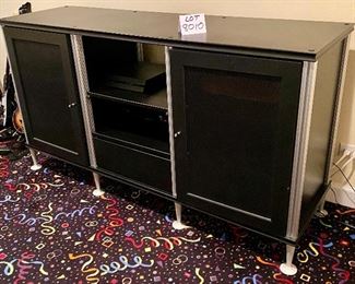Lot 8010.  $395.00. Very Cool Contemporary Black Media Cabinet  w/ 2 mesh front doors with 3 shelves behind each door, 2 center shelves and 1 drawer.	66" W x 20" D x 36" T