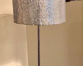 Lot 8012.  $75.00  Chrome base floor lamp with silver sequin shade (12" Diam),  sliding dimmer switch. 63" T, base is 10" Diam shade.