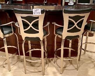 Lot 8014B. $400.00. ($100.00 Ea) Four black leather, swivel stools with brushed metal frame.  Seat Ht 30", stool 45" T and 21" W.   We split this lot into two Lots of 4 Stools.  One 4 Stool Lot has Sold