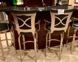 Lot 8014A $400.00. ($100.00 Ea) Eight black leather, swivel stools with brushed metal frame.  Seat Ht 30", stool 45" T and 21" W.   We can split this lot into Two Lots of 4 Stools.