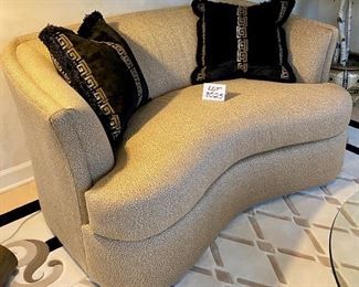zLot 8025. $700.00.Like New Curved Loveseat made by Precedent Furniture, done in gold tones, includes 2 black/gold Asian inspired pillows. Exc. Condition.	62" W x 40" D x 33" T Homeowner paid over $1,500.00 for this Loveseat. 