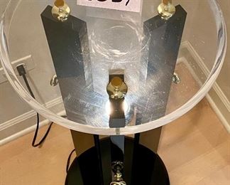 Lot 8031.  $165.00  Lighted acrylic pedestal,  with clear top and black pillars and base.	14" Diam x 30" Perfect for Art Pieces including: Art Glass, Statues and Art.  Don't ever see these in a sale, grab it while your can.