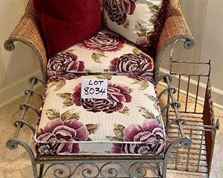 Lot 8034. $850.00. Attractive 8 pc sunroom set in light colored wicker with metal frame and legs.  Very Cute.  The set includes: a Loveseat with rolled arms (57" L); a coffee table with wicker top (32" W);  2 arm chairs 32" W x 34" T); an Ottoman (25" W); a side table, flower stand and magazine rack (22" W) and 8 decorative accent pillows.  This really is a COMPLETE SET, sure to brighten any spot you put it.