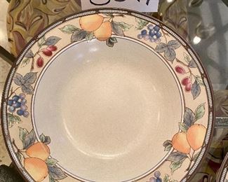 Lot 8047. $375.00. Mikasa Intaglio Garden Harvest China Set includes: 12 Six Piece Place Settings (Dinner Plates, Salad Plates, Bread & Butter Plates, Rimmed Soup Bowls, Cups & Saucers.  Serving Pieces on next lots,  This is a super attractive 72-pc set can be used formally. or every day.  Now that we can entertain again, it would be nice to tell family and friends that they are worth setting a beautiful table!  