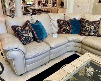 Lot 8054. $850.00. Natural/Tan Natuzzi Italian Leather Sectional Sofa w/ 2 Reclining Ends. Some areas need reconditioning as shown.  L Shaped 82" x 93", 36" D x 39" T 