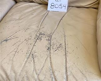 Lot 8054. $850.00.  Natural/Tan Natuzzi Italian Leather Sectional Sofa w/ 2 Reclining Ends. Some areas need reconditioning as shown.  L Shaped 82" x 93", 36" D x 39" T   Creases and Wear on cushion shown.  We dropped the price so the repair would be completely affordable to get the sofa reconditioned.  It's buttery leather and gorgeous.   We can get you the name of a good repair guy, and you get a $5,000 sectional recliner sofa for a fraction of that, even with the repair.