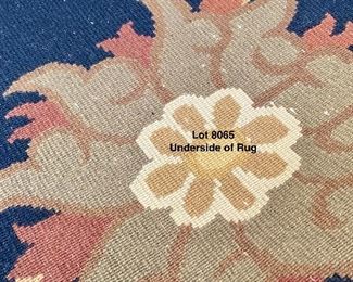 Lot 8065. $795.00. Absolutely Beautiful Navy Wool Area Rug with Shades of Gold and Taupe in a Floral Pattern. Hand-Made Chantilly Kunari   9' W x 12' L. View of underside of rug.