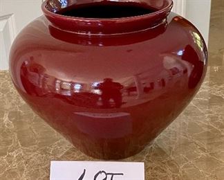 Lot 8083. $25.00 2 Pottery Pieces - Burgundy Haegar Vase ( 8" T x 11" Diam) and Black Glass Bowl Vase (9.5" T x 5" Diam)