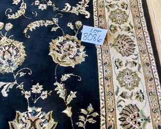 Lot 8086. $275.00  Royal Elegance custom designed and constructed, wool area rug.  Colors: Black, Tan and Khaki green.	90" L x 62" W