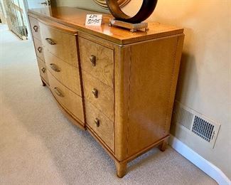 Lot 8095. $895.00  Bernhardt "Soleil" 9-Drawer Triple Dresser matches bed and night stands in previous or future lot.  Same gorgeous zinc hardware gives a richness to each piece.  68"w  21" D x 36.5" T.  	