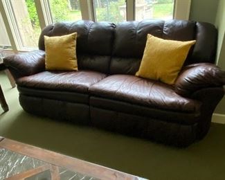Reclining leather loveseat 595.00
