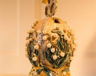 A reproduction Faberge Lilies of the Valley Egg from the original fashioned in 1898 as presented to Tsarina Alexandra. H 8 inches.  $500.00