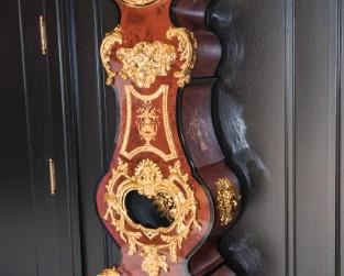 A Louis Quatorze Style Boulle Gilt Ormolu and Burl Walnut Vitrine. Circa 1990-2010. No Marks Evident. Dimensions: Height 85 x width 19 x depth 11 at pendulum. $10,000.00