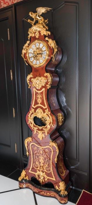 A Louis Quatorze Style Boulle Gilt Ormolu and Burl Walnut Vitrine. Circa 1990-2010. No Marks Evident.  Dimensions: Height 85 x width 19 x depth 11 at pendulum.	$10,000.00