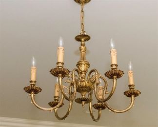 A Contemporary Brass Six Light Chandelier. Circa 2010-2013.
Condition: Very Good.
Dimensions: Height 17 x width 24 inches. $500.00