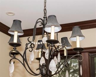 An American Wrought Iron and Leaded Glass Drop Six Light Chandelier. Dimensions: H 26 x D 30 inches approximately. $750.00