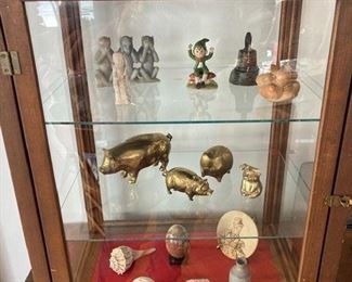 Misc. collectible figures, brass pigs, wood/glass table top display cabinet
