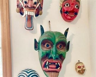 Vintage and primitive hand carved masks, small chalk face figure