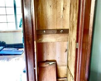 Inside view of large antique wardrobe/armoire