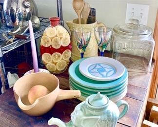 Misc. kitchen collectibles, pottery plates, stoneware pitcher, pair of Murino stems, Planter's Peanuts glass jar, etc.