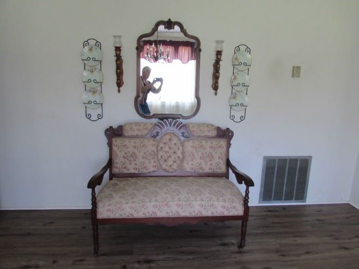 Rosewood settee, walnut mirror, pine sconces, Bavarian plates with holder