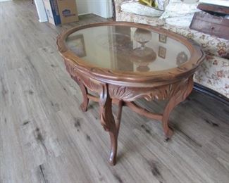 Carved glass top coffee table
