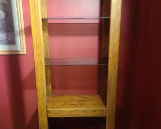 Solid wood w/partial glass shelving = heavy/sturdy
We have 2
