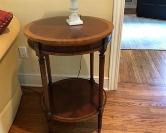 3. Round Inlaid Accent Table (23" x 31")
