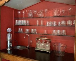 Wet bar. Crystal and silver set retained by family.