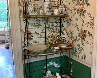 Brass and iron baker's rack in the breakfast room. Pottery NOT in sale. 