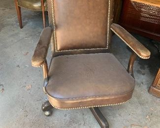 Vintage leather rolling chair