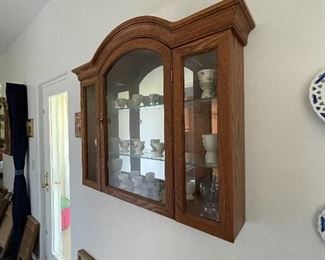 Wall mount display cabinet.