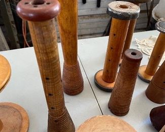 Antique and vintage wooden sewing spools. 