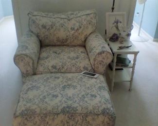 Overstuffed chair and ottoman