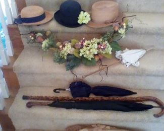 Vintage parasoles, cane and hats