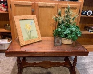 Antique coffee table with glass top, picture frames, florals and greenery, handpainted pictures