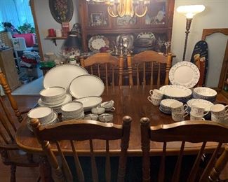 Dining room table, six chairs, and one leaf. Stoneware, and China