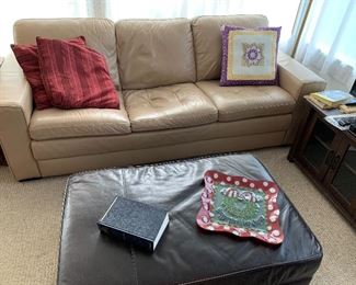 Cream leather sofa, brown leather lift top ottoman 