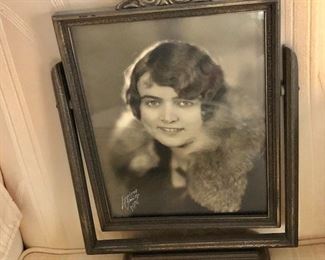 $95 Photo of smiling woman in antique tilting frame
12.5” H x 9” W
