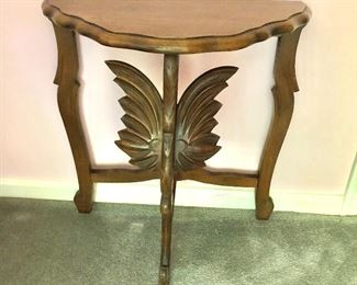 $120 - Carved wood demilune table. 22.5" H x 21" W x 11.5" D