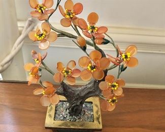 $25 Glass floral sculpture as is one chip in petal. Approx 8.5" H, 5.5" W.
