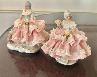 $45 Pair porcelain ladies as is chips on skirt.  Each approx 4" H, 4" W. 