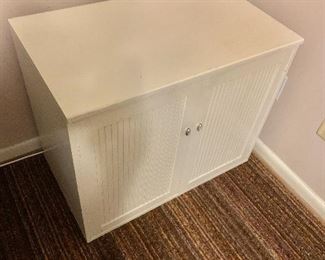 $50 - Painted white wood cabinet. 24.5" H, 30" W, 17.5" D.