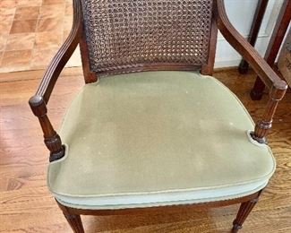 $120 - Single cane back arm chair - 34" H, 25.5" W, 25" D, seat height 18".