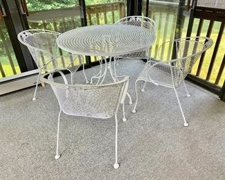 $295 - Vintage patio table and chairs - 29" H, 42" diam.  Set of 4 matching chairs: each 30.5" H, 21" W, 25" D, seat height 17". 